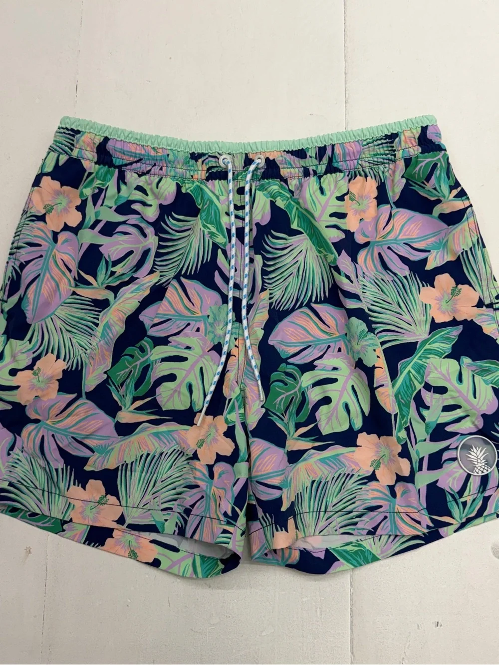 Chubbies Navy Mint Tropical Floral Palm Swim Trunks 5.5